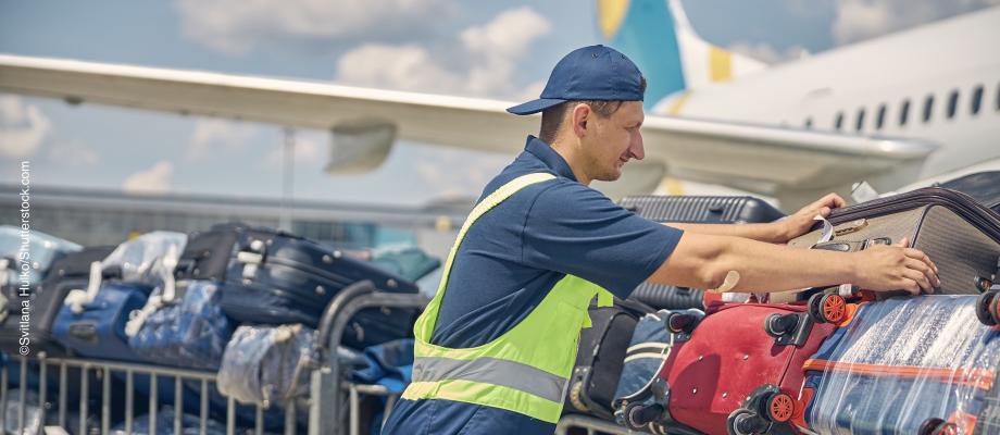 Manueel hanteren van lasten - bagage luchthaven